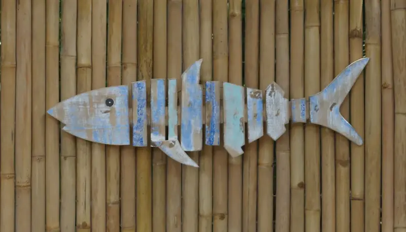 Product image of the product “Fish shape to hang, made of wood, mixed color. 100cm Length. ”